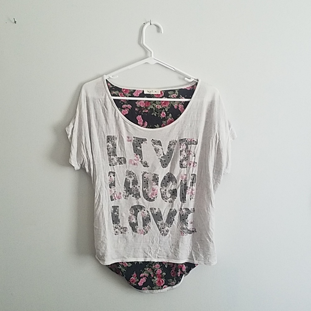 White t-shirt with writing of Live, Laugh, Love